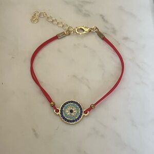 Protection red string evil eye 🧿 bracelet and ring.